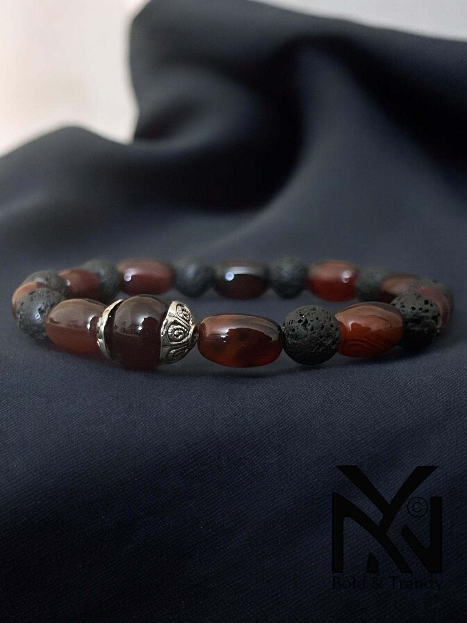 Flamme d'Énergie bracelet back view highlighting bold red and black stone details for powerful energy